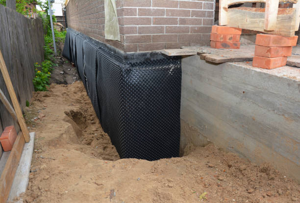 Happy homeowners after waterproofing job in Rodney
